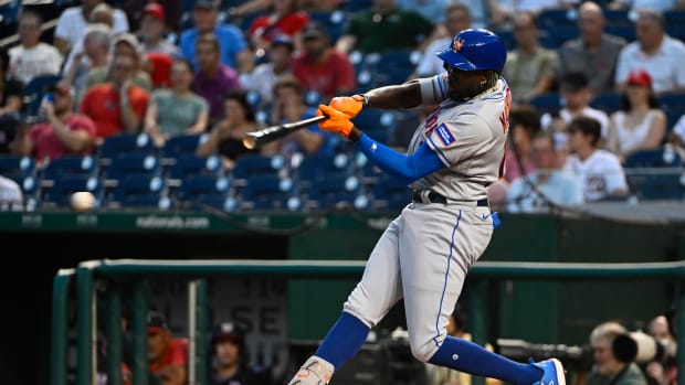 Sep 6, 2023; Washington, District of Columbia, USA; New York Mets second baseman Ronny Mauricio (10) singles against the Washington Nationals during the second inning at Nationals Park.